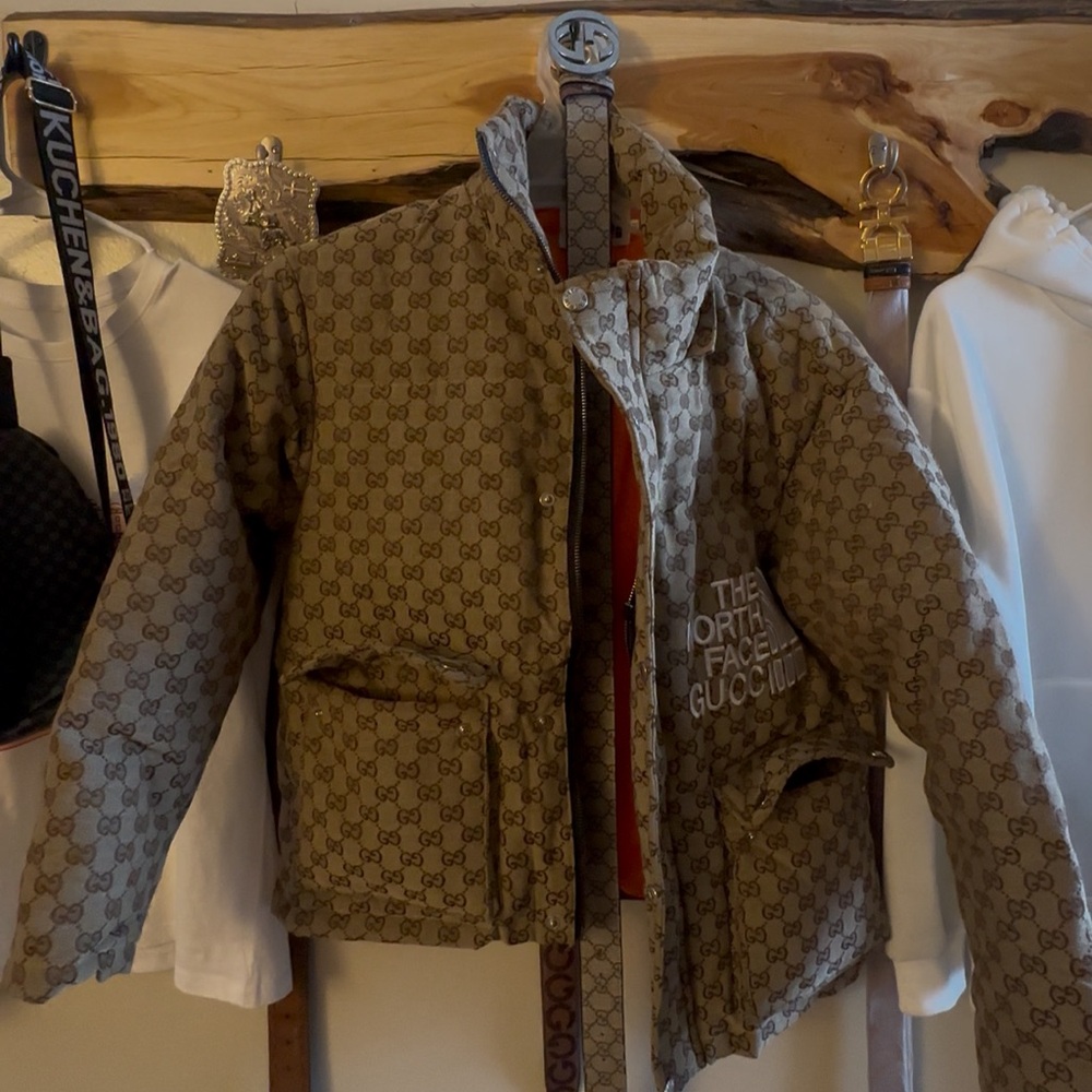 very luxurious puffer from the north face gucci collab.